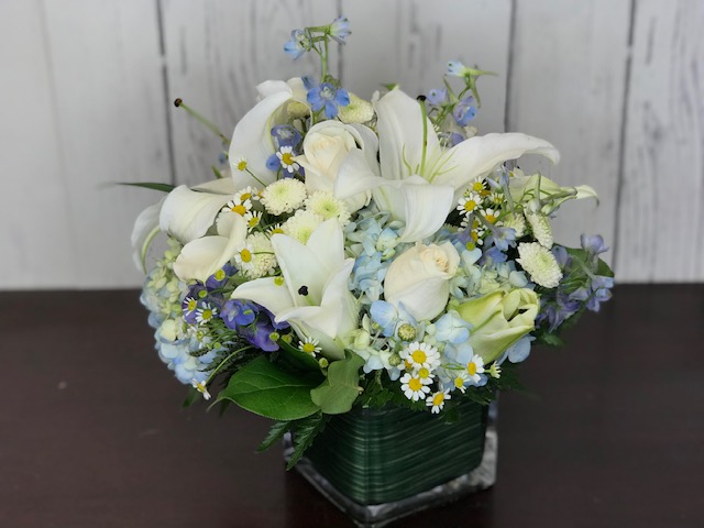 Serene white a blue sympathy arrangement